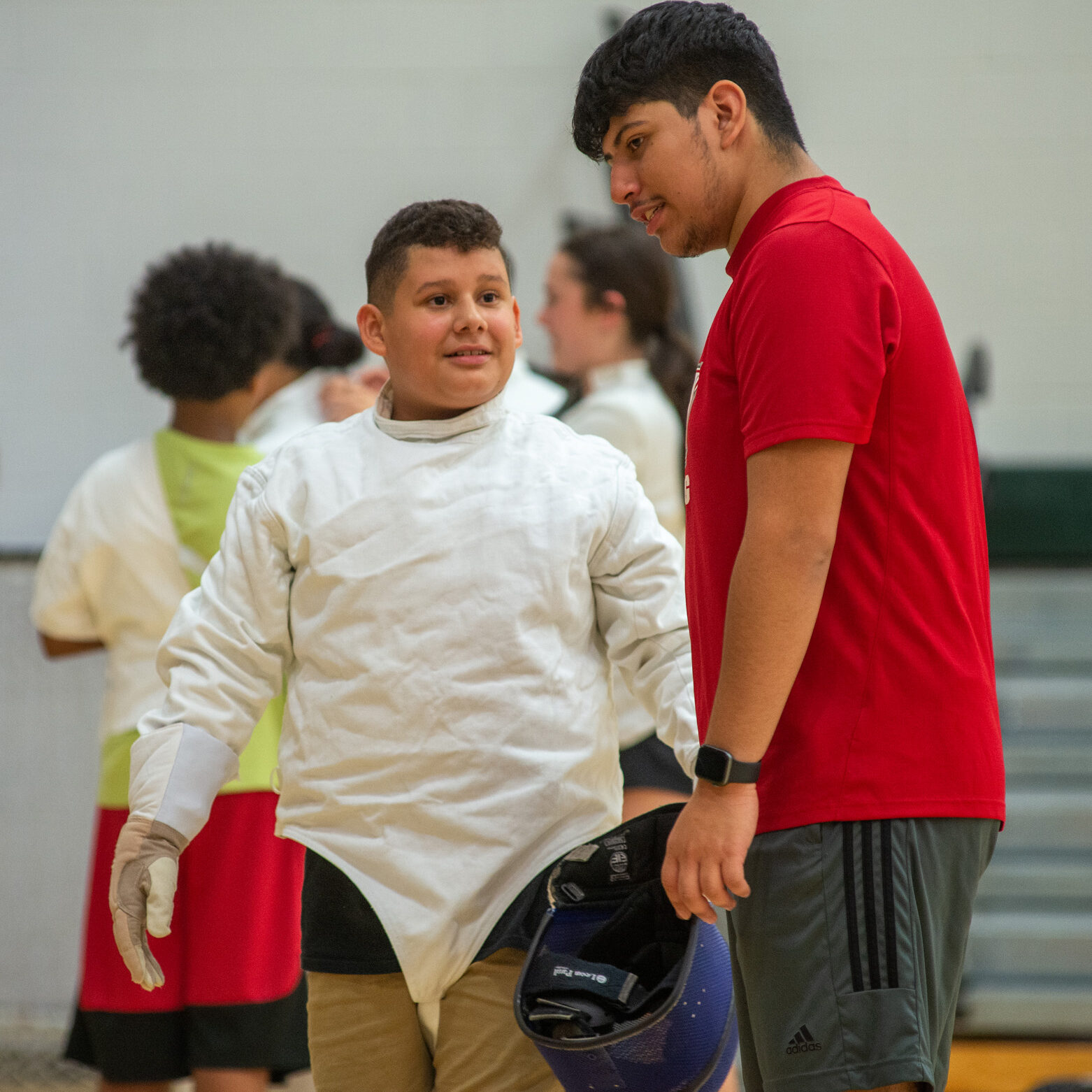 Sacred Heart University’s NCAA Division I fencing team has embarked on a collaboration with The Willie and Sandra McBride Foundation, which has started a fencing program for middle school students in Bridgeport. The team worked with children at the Fairchild Wheeler Interdistrict Magnet School during a recent training session. Sacred Heart University photo by Tracy Deer-Mirek 10/6/22